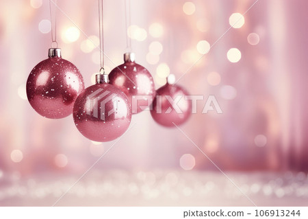 Pink trendy Christmas hanging decorations on pink background 106913244