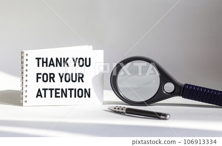 Thank you for your attention - a notebook is on a white background, Thank you for your attention - a notebook is on a white background, 106913334