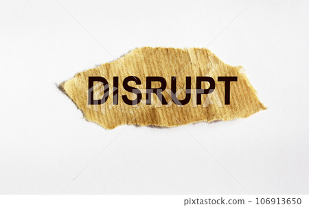 disrupt. text on white paper on torn paper disrupt. text on white paper on torn paper 106913650