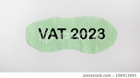 Green paper with the message VAT 2023 on a white background Green paper with the message VAT 2023 on a white background 106913665