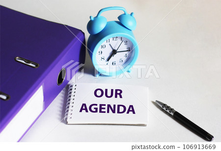 Business concept - Top view notebook writing Our Agenda Business concept - Top view notebook writing Our Agenda 106913669