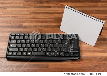 keyboard and white sketchbook keyboard and white sketchbook 106913910