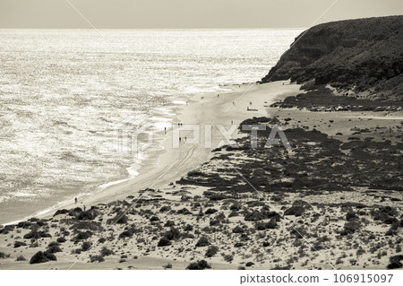 Black and white photo of a bay on the Canary Islands Fuerteventura Black and white photo of a bay on the Canary Islands Fuerteventura 106915097