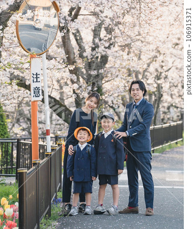 New first graders and their families in front of the cherry blossoms New first graders and their families in front of the cherry blossoms 106915371
