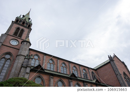 Myeongdong Cathedral, the national cathedral of the Roman Catholic Archdiocese of Seoul, South Korea. Located in the Myeongdong neighborhood 106915663