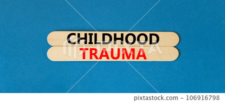 Childhood trauma symbol. Concept words Childhood trauma on beautiful wooden stick. Beautiful blue table blue background. Business psychology childhood trauma concept. Copy space. 106916798