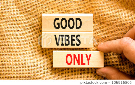 Good vibes only symbol. Concept word Good vibes only on beautiful wooden block. Businessman hand. Beautiful canvas table canvas background. Business motivational good vibes only concept. Copy space. 106916805