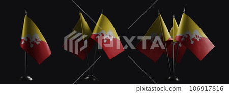Small national flags of the Bhutan on a black background 106917816