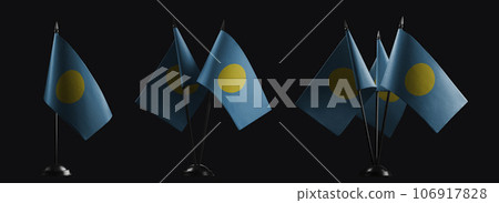 Small national flags of the Palau on a black background Small national flags of the Palau on a black background 106917828