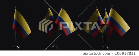 Small national flags of the Colombia on a black background 106917831