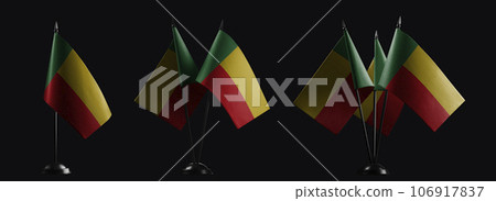 Small national flags of the Benin on a black background Small national flags of the Benin on a black background 106917837
