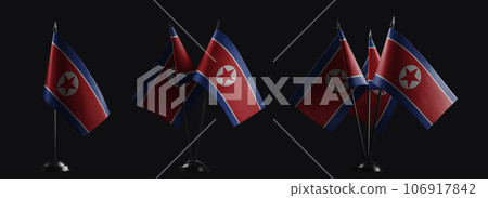 Small national flags of the North Korea on a black background Small national flags of the North Korea on a black background 106917842