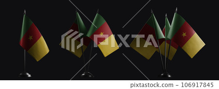 Small national flags of the Cameroon on a black background 106917845
