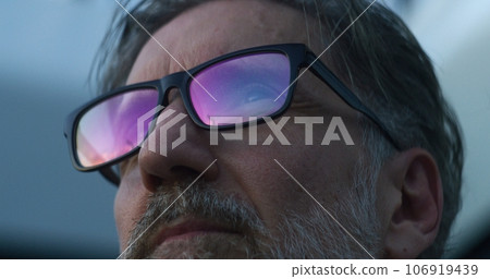 Tired doctor drinks coffee, rests after shift 106919439