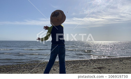 Children playing on the beach 106919730