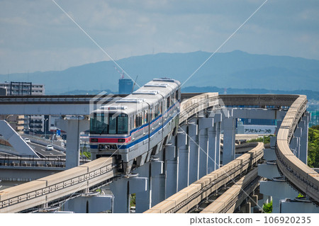 Monorail departing from Banpaku Kinen Koen Station and heading towards Saito West 106920235