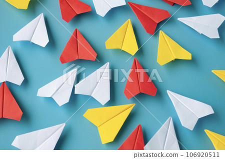 Top view of assorted colorful paper airplanes. Airplane concept Top view of assorted colorful paper airplanes. Airplane concept 106920511