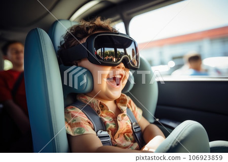 Boy wearing virtual reality headset sitting on car seat. VR goggles innovation technology. Generative AI Boy wearing virtual reality headset sitting on car seat. VR goggles innovation technology. Generative AI 106923859