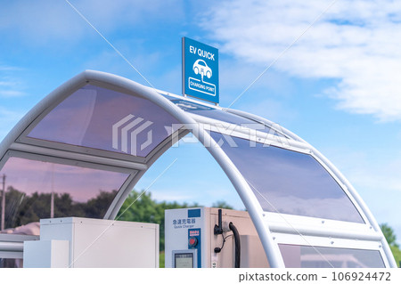EV charging spot electric car quick charger EV QUICK CHARGER blue sky EV charging spot electric car quick charger EV QUICK CHARGER blue sky 106924472