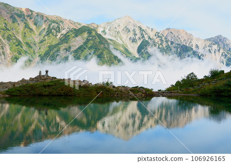 Northern Alps reflected in Happo Pond Northern Alps reflected in Happo Pond 106926165