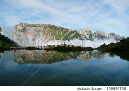 Northern Alps reflected in Happo Pond Northern Alps reflected in Happo Pond 106926166