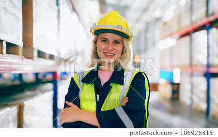 Young woman happy standing and looking at camera Young woman happy standing and looking at camera 106926315