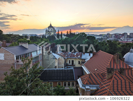 July 2023. Ukraine. Lviv. An incredibly beautiful panorama at sunset. Romantic Lviv from a bird's eye view. Lviv is the cultural capital of Ukraine and a favorite destination for tourists from all July 2023. Ukraine. Lviv. An incredibly beautiful panorama at sunset. Romantic Lviv from a bird's eye view. Lviv is the cultural capital of Ukraine and a favorite destination for tourists from all 106926322
