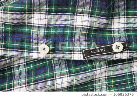 label tag slim fit on a men shirt  106926376