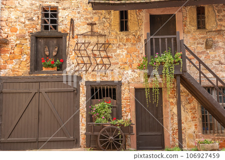 Old traditional farmyard restored in the town center. Old traditional farmyard restored in the town center. 106927459