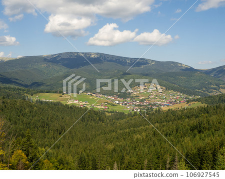 Summer view of mountain ski resort with houses and hotels in Bukovel, Ukraine 106927545