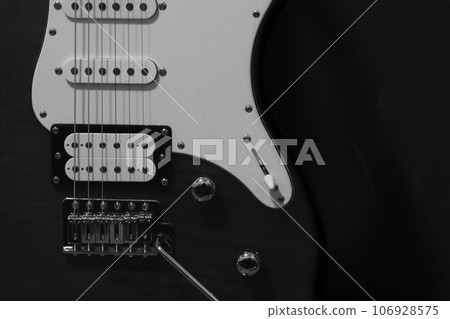Image of electric guitar (black background) Image of electric guitar (black background) 106928575