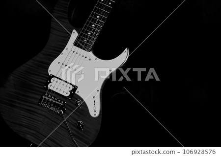 Image of electric guitar (black background) Image of electric guitar (black background) 106928576