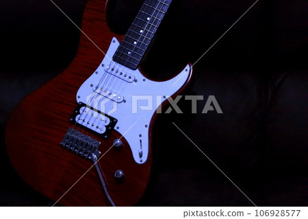 Image of electric guitar (black background) Image of electric guitar (black background) 106928577