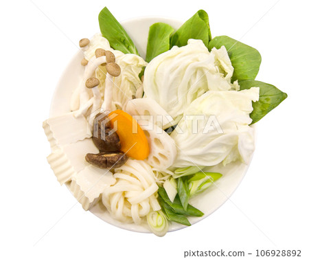 Top view of mixed Fresh vegetables washed clean on white isolated, focus selective 106928892