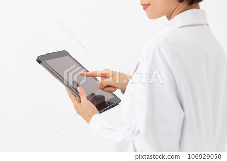 A white lady with a tablet 106929050