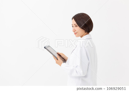 A white lady with a tablet A white lady with a tablet 106929051