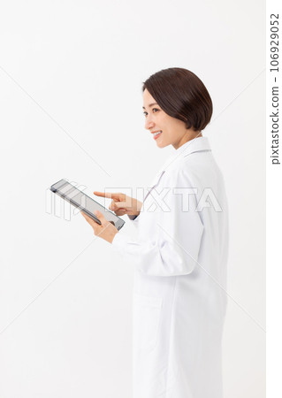 A white lady with a tablet A white lady with a tablet 106929052
