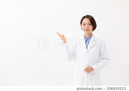 Woman in white coat medical hand holding 106929323