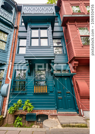Facade of colorful wooden houses painted in red and green, located in Kuzguncuk, Uskudar district, Istanbul, Turkey Facade of colorful wooden houses painted in red and green, located in Kuzguncuk, Uskudar district, Istanbul, Turkey 106930456