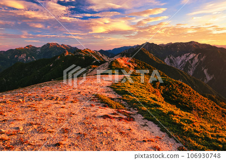 Ura Ginza Traverse Road behind the Northern Alps at sunrise 106930748