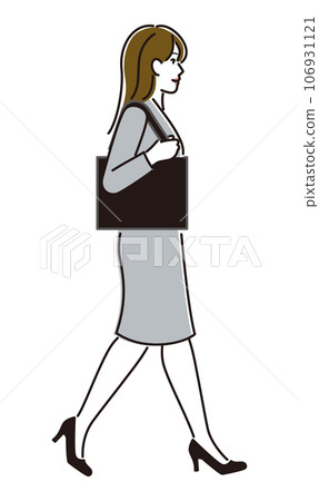A woman in a suit walking with a bag 106931121