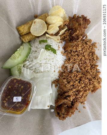 A portion of delicious Fried Chicken with Rice 106931175