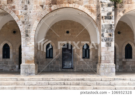 Ancient building in Jerusalem with arches and pillars Ancient building in Jerusalem with arches and pillars 106932328