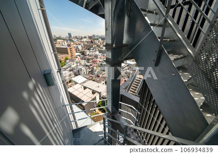 Emergency stairs and fire extinguishing equipment in business buildings Emergency stairs and fire extinguishing equipment in business buildings 106934839