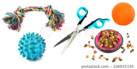 Dry food, Scissors and toys for pet on isolated white. Wide photo. Collage. 106935195