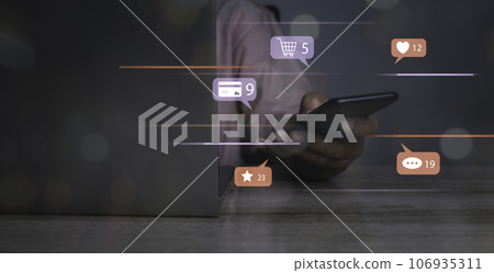 Man using social media shopping online marketing with notification icons. 106935311