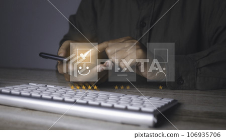 Businessman giving high score with five golden stars rating satisfaction in service. 106935706