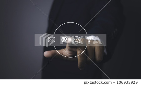 Man touching contact access connect online with virtual screen contact icons. Man touching contact access connect online with virtual screen contact icons. 106935929