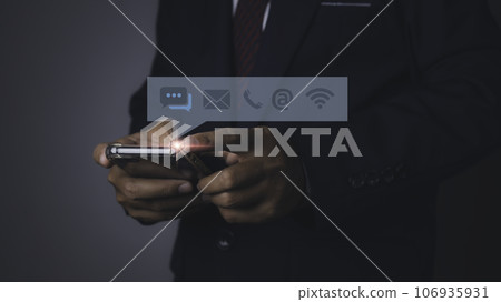 Businessman access contact connect online by smartphone with contact icons. Businessman access contact connect online by smartphone with contact icons. 106935931
