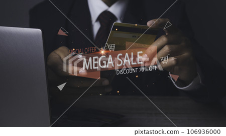 Businessman using mobile phone and credit card shopping online 106936000